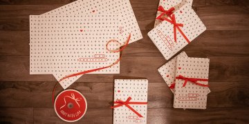 gifts wrapped with red ribbon